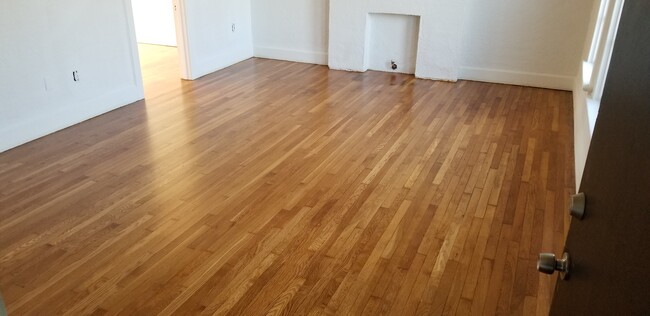 Hardwoods throughout ! - 2114 McMillan Ave
