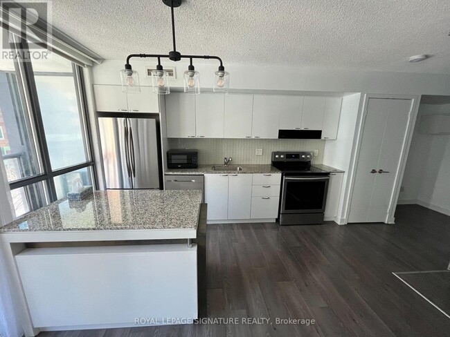 Photo du bâtiment - 110 Charles St E