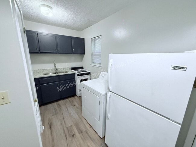 Foto del edificio - 1BR/1BA FOR RENT