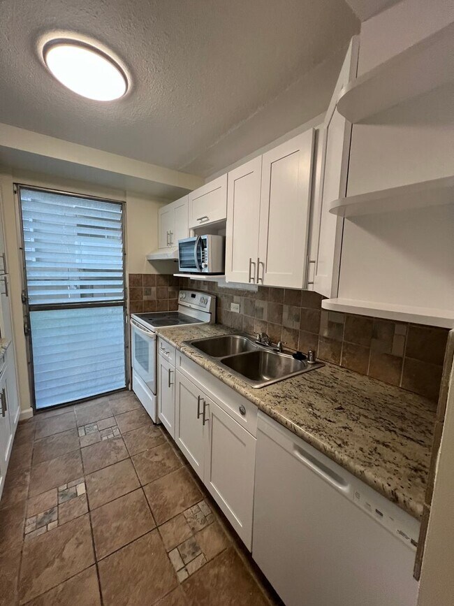 Foto del edificio - 1 bedroom, 1 bath, 1 parking in the heart ...