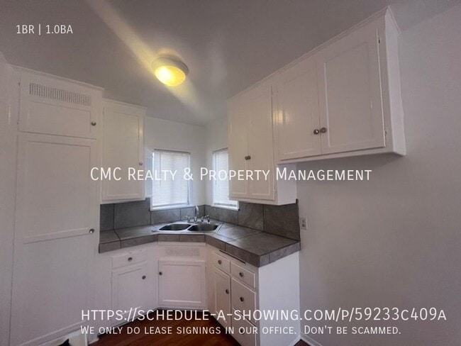 Building Photo - 4423 N Bellflower Blvd