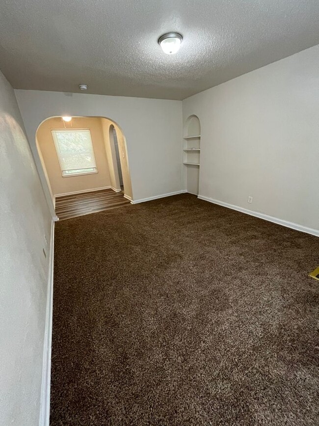 Building Photo - Bright & Spacious Studio Just Minutes from...