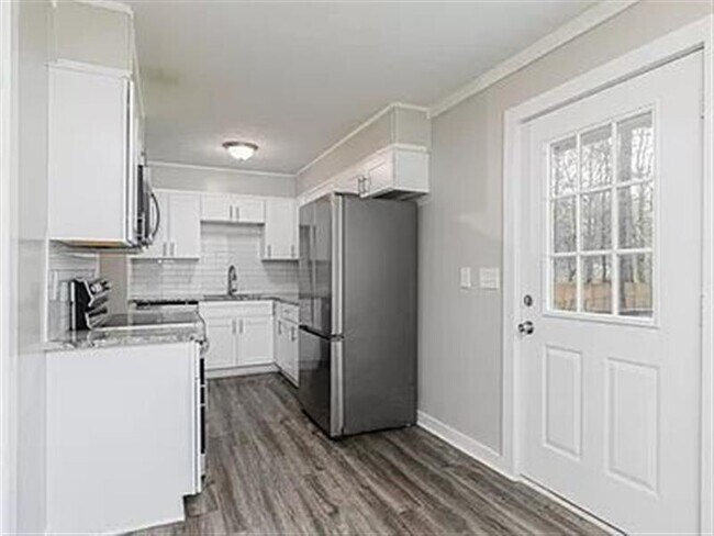 Building Photo - Powder Springs home is here