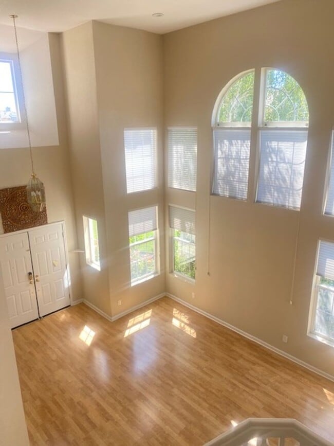 Building Photo - Spacious 5-Bedroom Home with Solar, Stunning Sunroom & Upgraded Bathrooms!