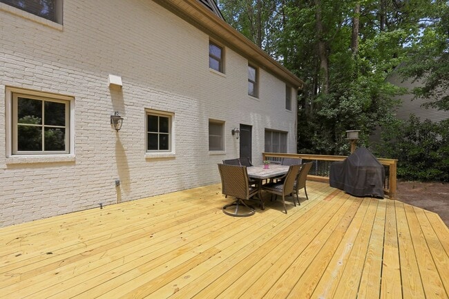 Building Photo - Stunning 5BR Inside-the-Beltline Retreat Near Crabtree & North Hills!