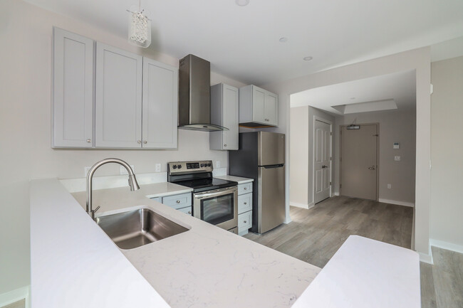 Unit 107 Kitchen - Liberty Plaza Suites