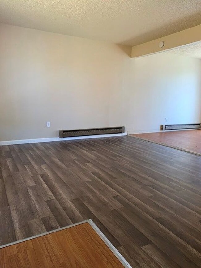 Building Photo - Unit in 8-plex complex