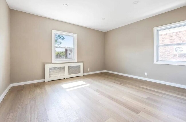 Building Photo - 208-12 53rd Ave