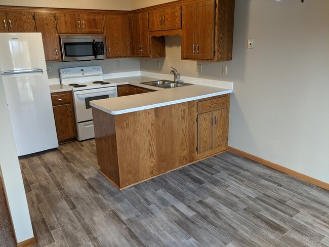Kitchen from Dining Area - 7644 Woodlawn Dr