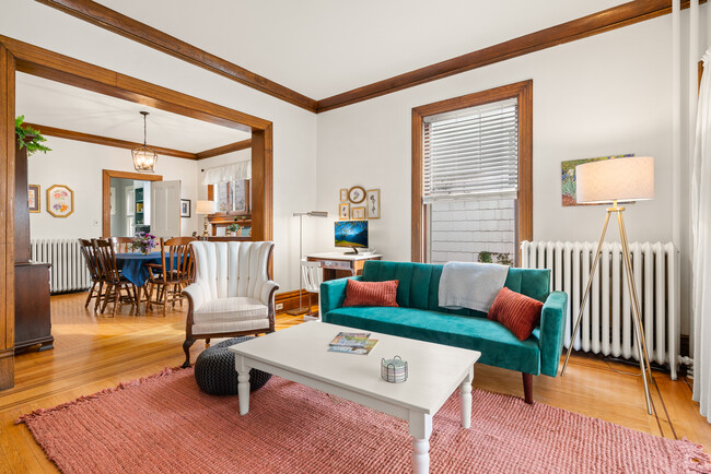 Living room, looking towards dining room - 210 W 27th St