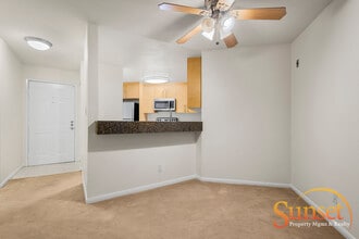 Building Photo - 7565 Charmant Dr