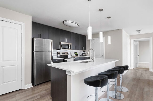 Beautiful Kitchen with Island - Autumn Breeze Apartments