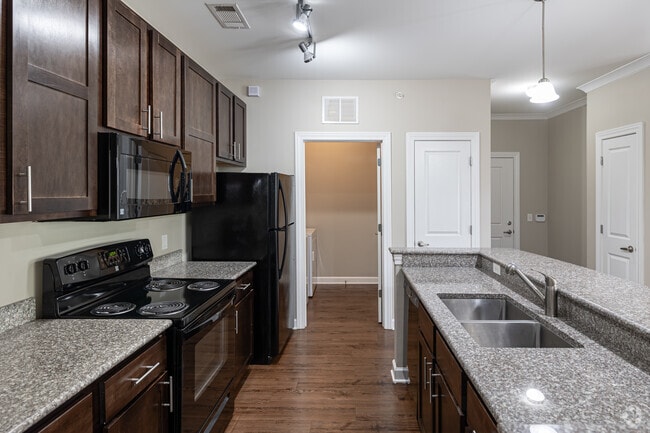 1BR, 1BA - 832SF - Kitchen - The Promenade Apartments at Pinnacle Hills