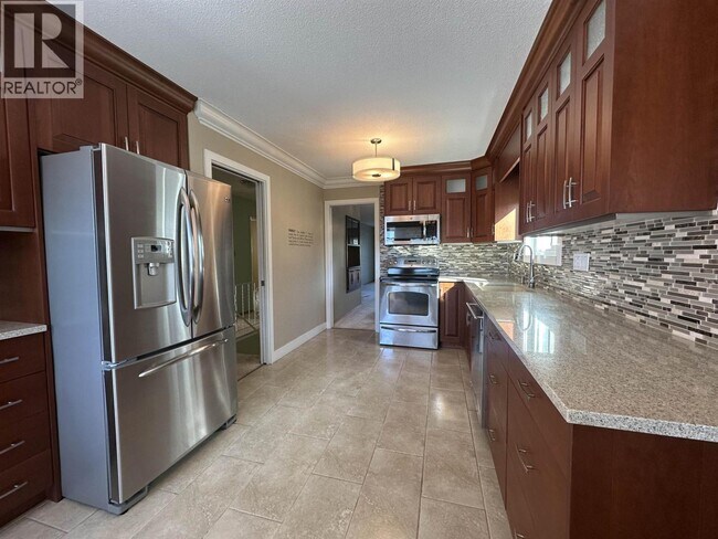 Photo du bâtiment - 1542 W 65th Ave