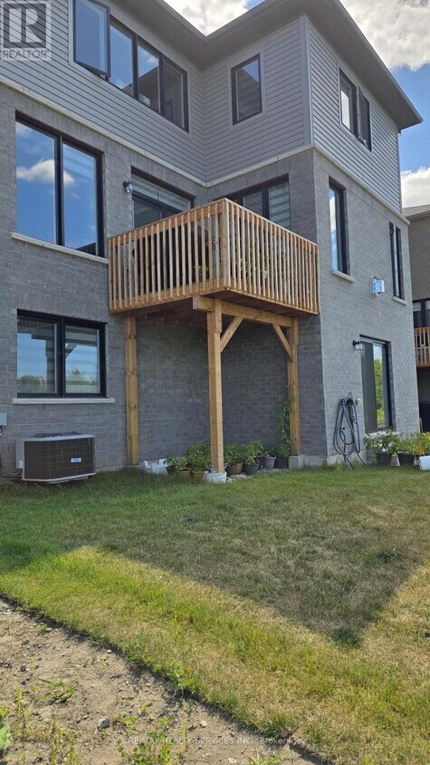 Photo du bâtiment - 148 Thicketwood Ave