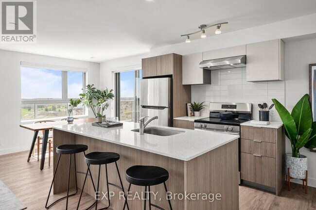 Building Photo - 100-100 Manett Crescent