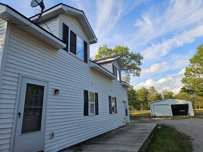 The side of the building you can see the front and rear apartment. - 4304 Kateri Ln