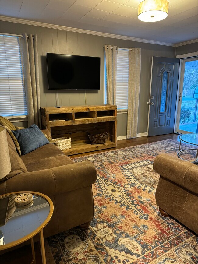 Large screen TV in family room - 1104 Kenwood Ave