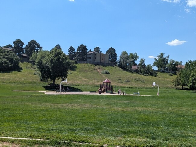 Basketball court and playground across the street. - 3080 Capstan Way
