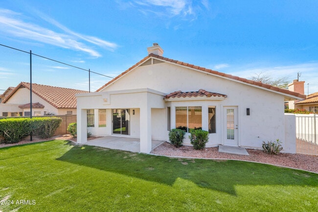 Building Photo - 1706 E Windsong Dr