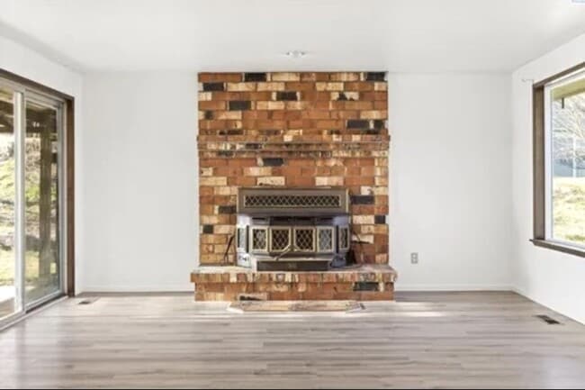 Building Photo - Elegant 4-Bedroom Home on a Corner Lot in ...