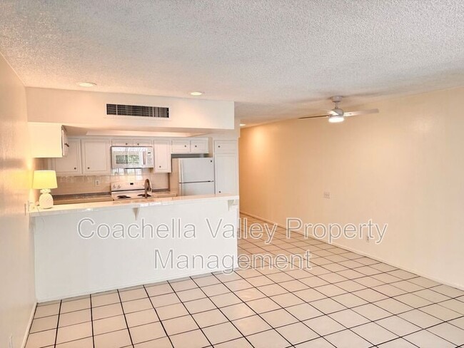 Building Photo - 1655 E Palm Canyon Dr
