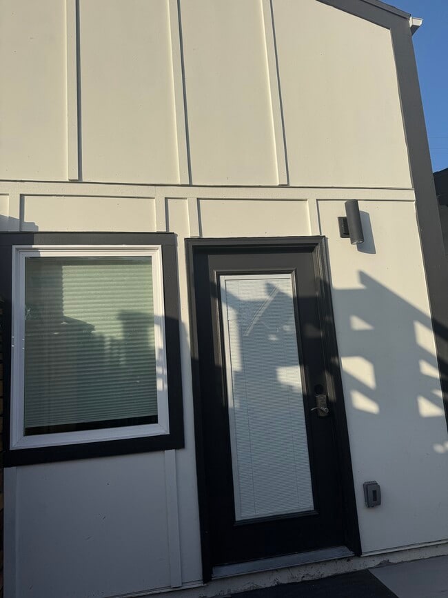 entrance to tiny home, which is actually in the yard - 3744 Granada Ave