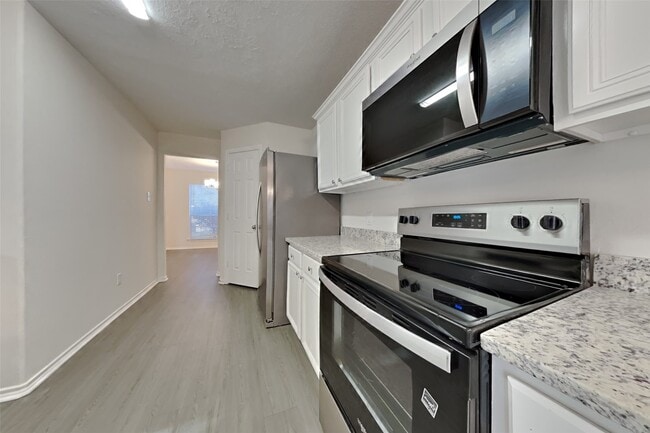 Foto del edificio - 18114 Stone Trail Manor Dr