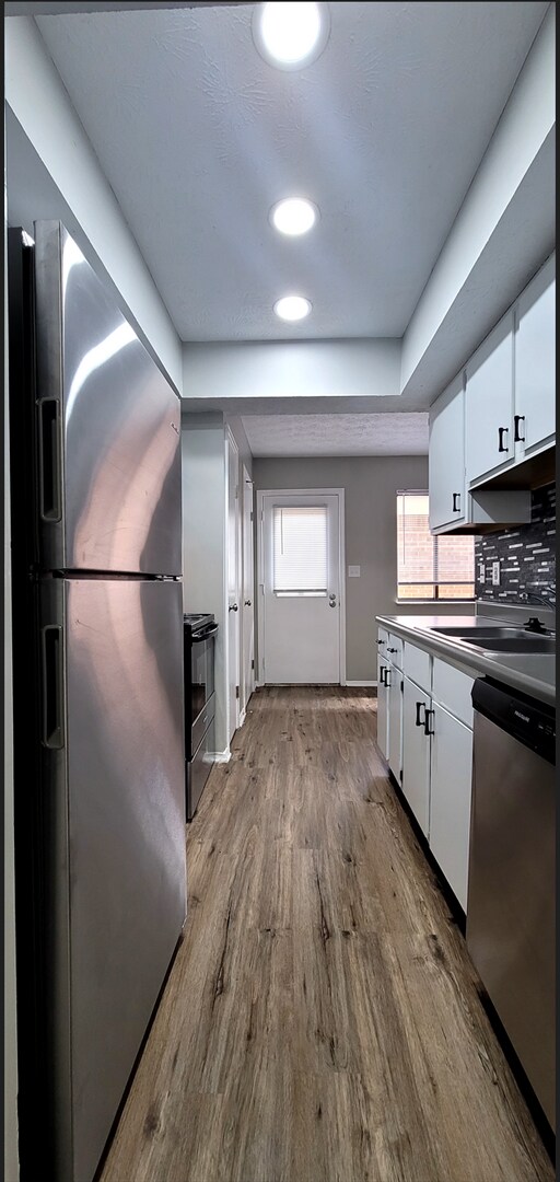 Building Photo - Beautiful 2 bedroom 1.5 bath Condo with at...
