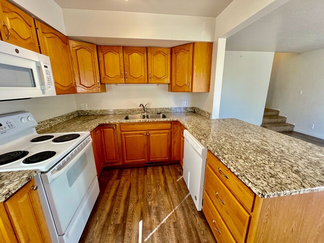 Building Photo - Updated 3-BR Tri-Level Townhome with Walk-...