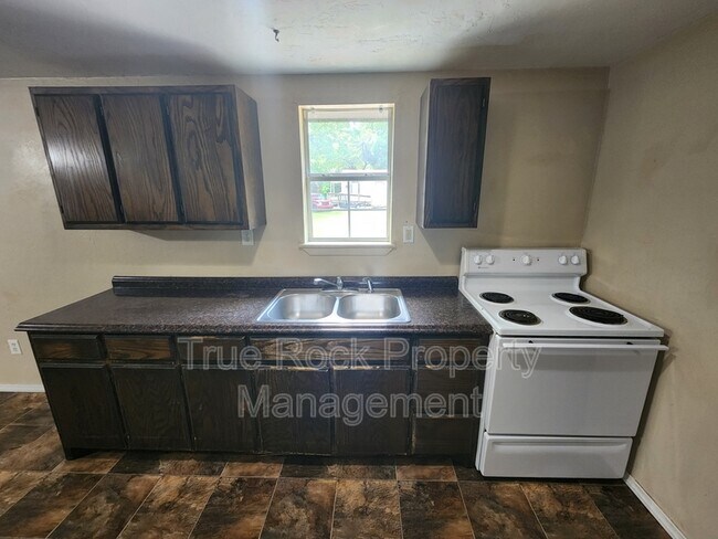 Foto del edificio - 320 W 8th St