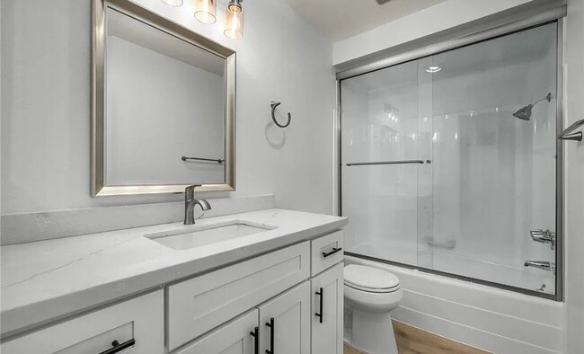 Building Photo - A completely updated first-floor Estates L...
