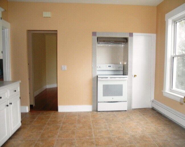 Oven view into dining room - 129 Brown St