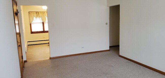 Living Room into Kitchen - 7400 W Diversey Ave