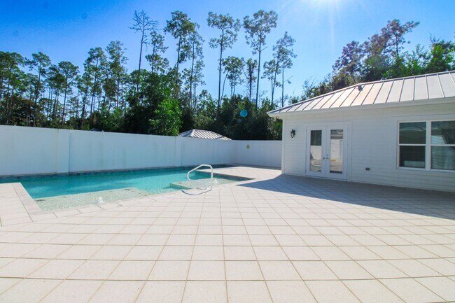 Foto del edificio - ***ANNUAL UNFURNISHED RENTAL***3 BEDS/2 BATHS**PRIVATE BACKYARD ON 4.65 ACRES***