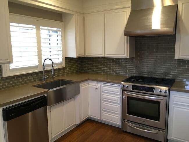 stainless hood, stove, farm sink,dishwasher - 1475 Mar Vista Ave