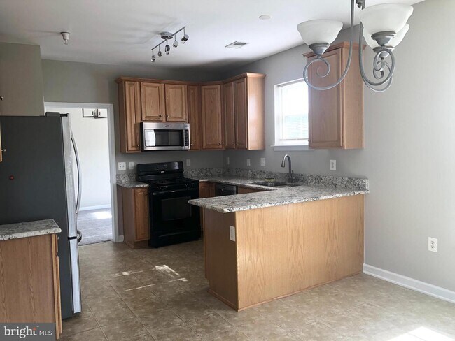 Building Photo - 9700 Elzey Place