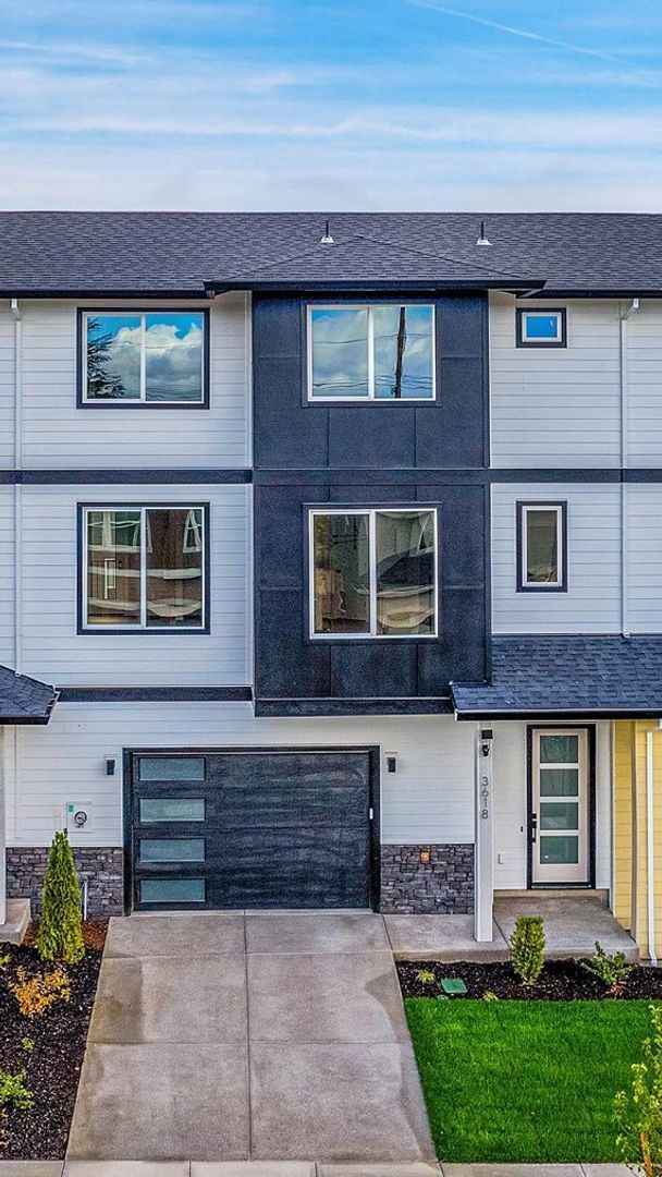 Building Photo - Brand New Modern Open-Concept Condo with Kitchen Island, Granite Counters and a Deck