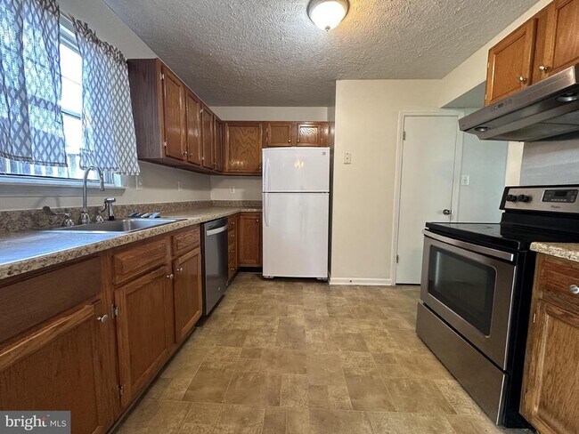 Foto del edificio - 8625 Cartwright Ct