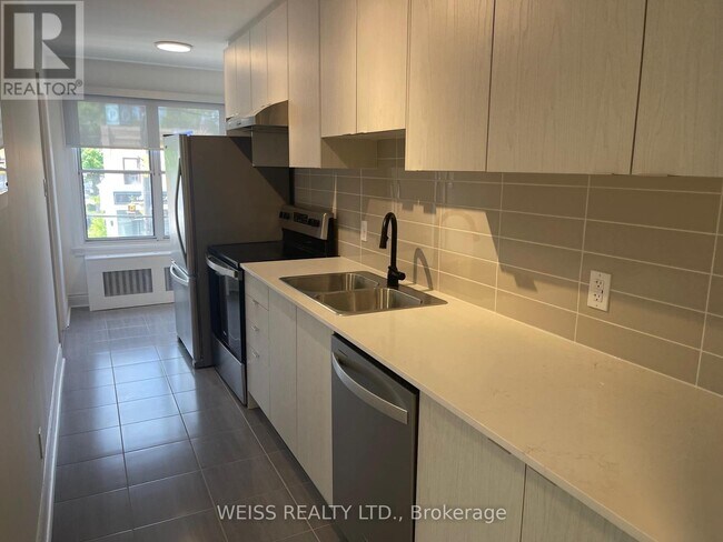 Photo du bâtiment - 517-517 Eglinton Ave W