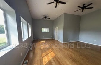 Building Photo - 7038 W Blanchard Rd