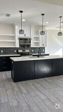 Building Photo - 8817 Swan Lk Dr