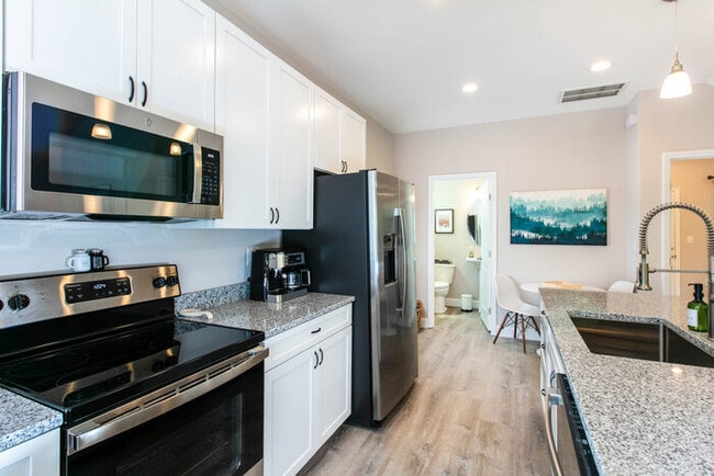 Building Photo - Spacious Three Bedroom w/ Loft Space