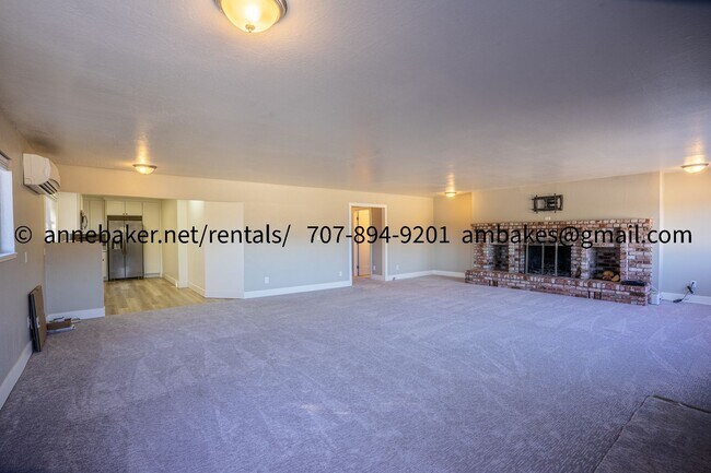 Building Photo - Unique and Spacious Rooftop Style Living |...