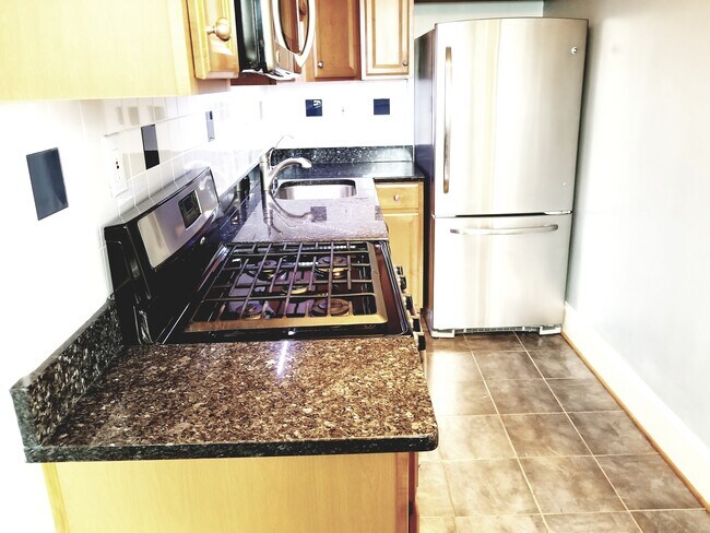 Foto del edificio - 3314 Mt Pleasant St NW #42
