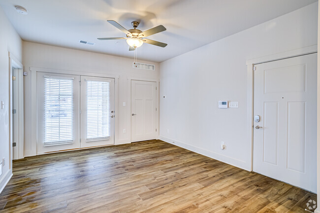 1 BD, 1 BA - Living Room - The Village at Great Acres