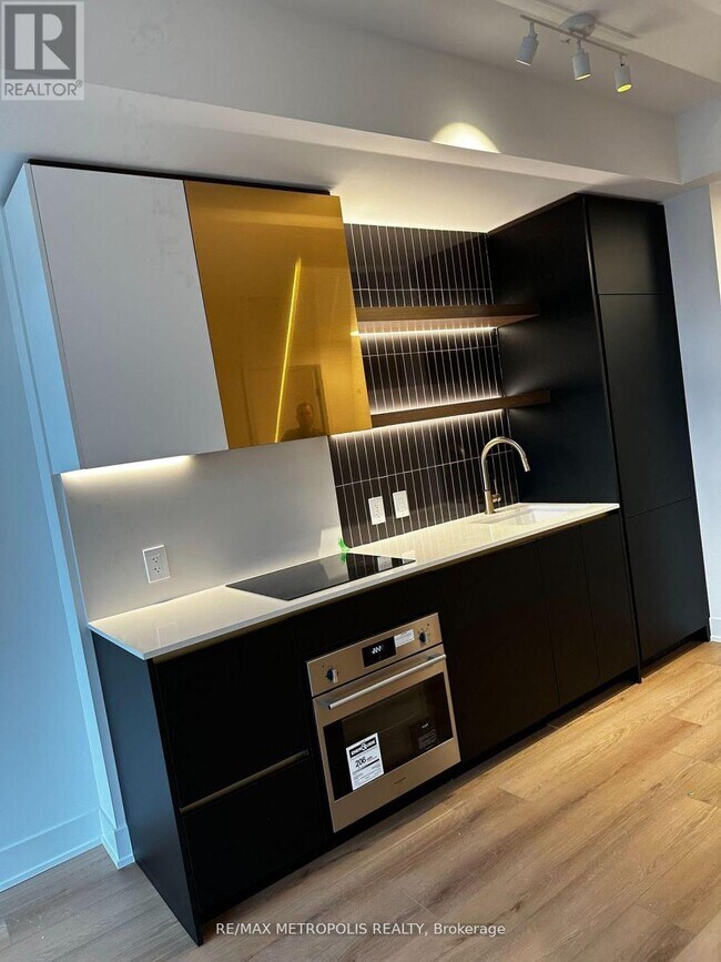 Photo du bâtiment - 406 Queen St E