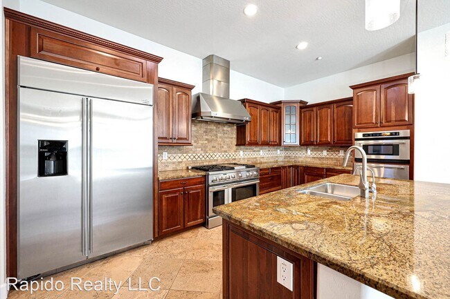 Building Photo - 4 br, 3.5 bath House - 9209 E. Desert Arroyos