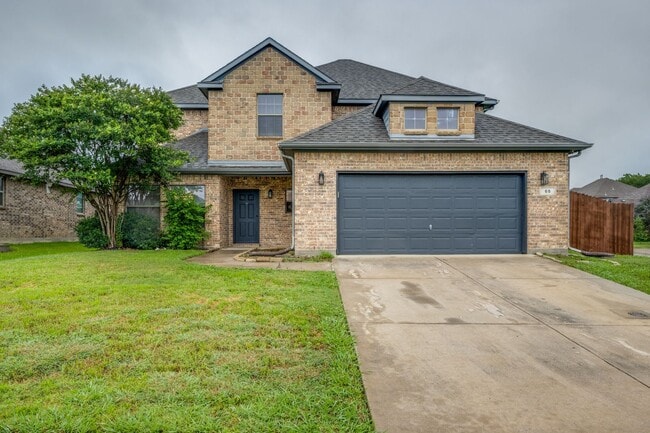 Building Photo - Exclusive 4 Bedroom • Lovely Backyard Spac...