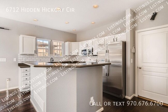 Foto del edificio - 6712 Hidden Hickory Cir